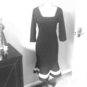 Classic black dress with flair bottom